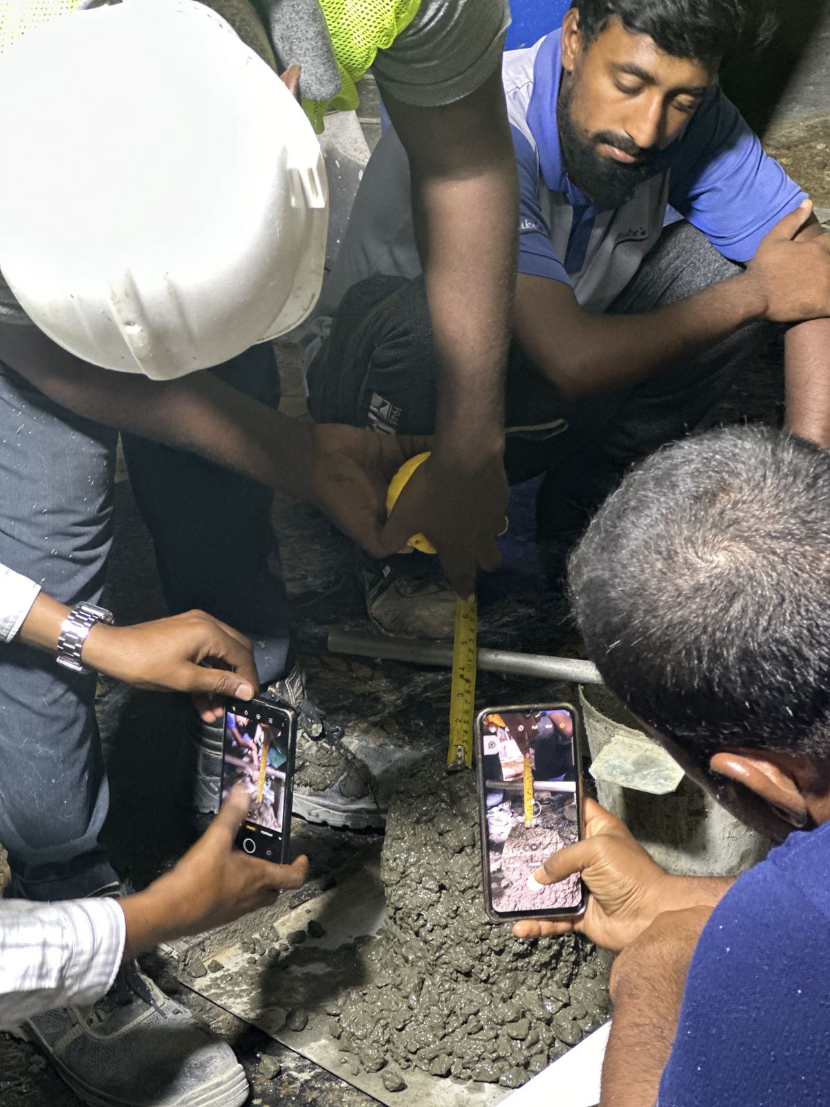 SCC technicians measuring a slump test on site