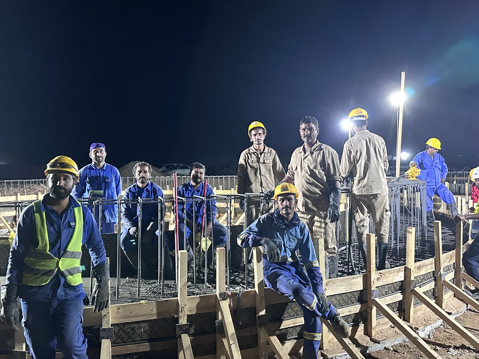SCC crew at a raft foundation pour at night